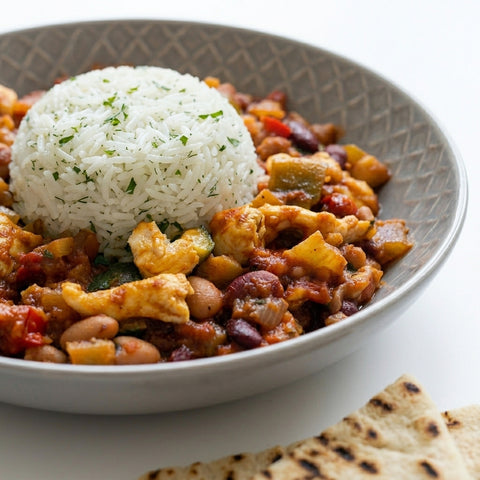 Slow cooked Five Bean Chilli served with Cheddar Curd and Rice Pilaf