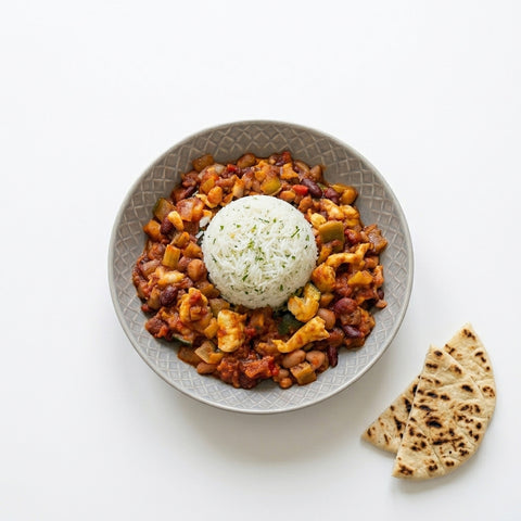 Slow cooked Five Bean Chilli served with Cheddar Curd and Rice Pilaf